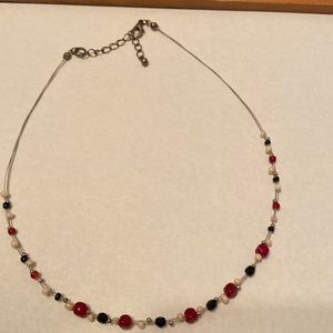 18” adjustable wire necklace with red, black and whit beads